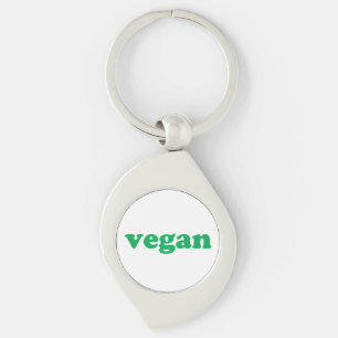 "vegan" green letters, white background key ring