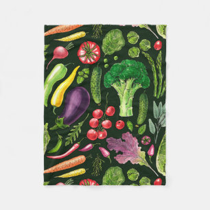 Vegetable and herbs garden harvest on black fleece blanket