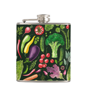 Vegetable and herbs garden harvest on black hip flask