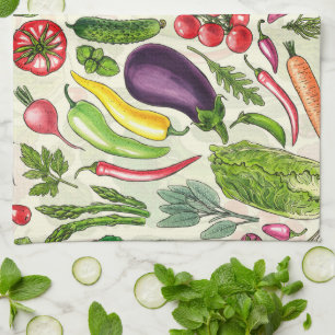Vegetable and herbs garden harvest on off white tea towel
