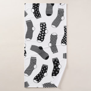 Vertical texture of striped and polka dot socks. B Bath Towel