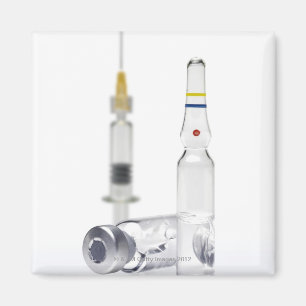 Vials containing medicine for injections and magnet