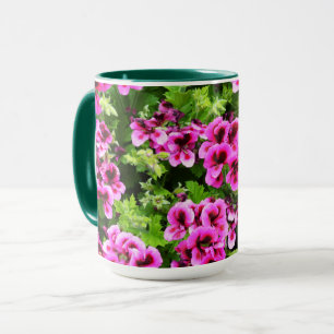 "Vibrant Blooms: Hot Pink Geraniums on Lush Bush Mug