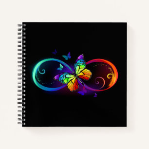 Vibrant infinity with rainbow butterfly on black  notebook