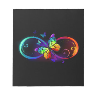 Vibrant infinity with rainbow butterfly on black notepad