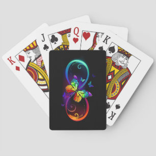 Vibrant infinity with rainbow butterfly on black playing cards