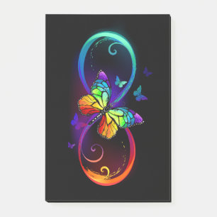 Vibrant infinity with rainbow butterfly on black  post-it notes