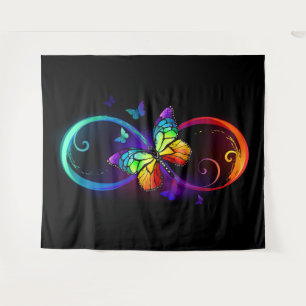 Vibrant infinity with rainbow butterfly on black tapestry