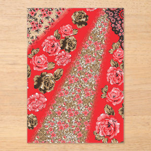 Vibrant red fabric featuring intricate floral and acrylic invitations