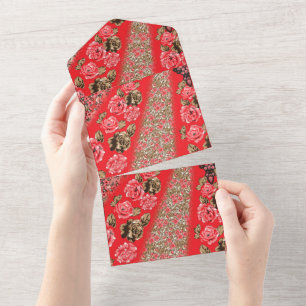 Vibrant red fabric featuring intricate floral and all in one invitation