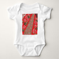 Vibrant red fabric featuring intricate floral and
