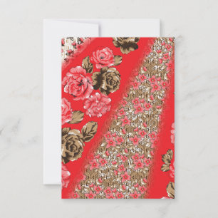 Vibrant red fabric featuring intricate floral and  card
