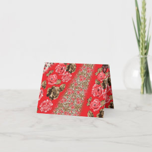 Vibrant red fabric featuring intricate floral and invitation