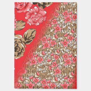 Vibrant red fabric featuring intricate floral and  magnet