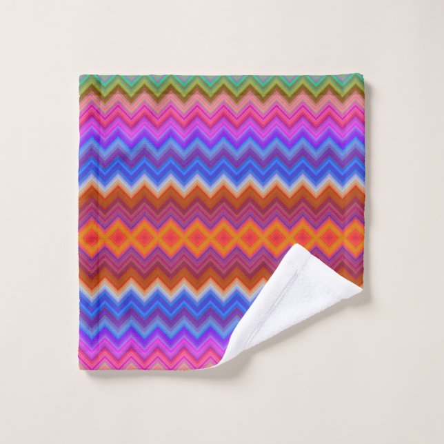 Vibrant towels hang on a rod, featuring a colourfu (Wash Cloth)