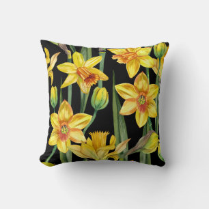 vibrant yellow daffodils and green stems cushion