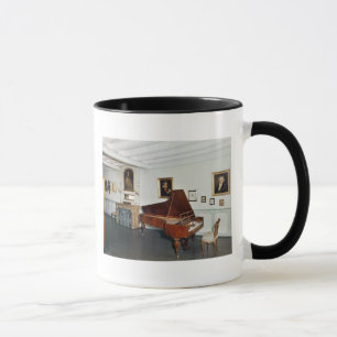 View of a room with a grand piano mug