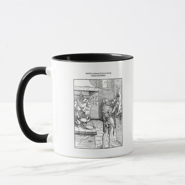 View of a sixteenth century kitchen with cook mug (Left)