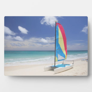 View Of Beach With Sailboat Plaque