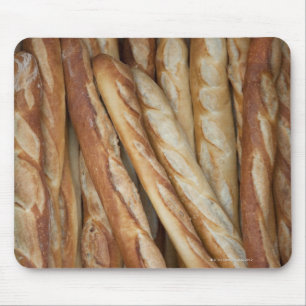 view of bread loaves in bakery window display mouse pad