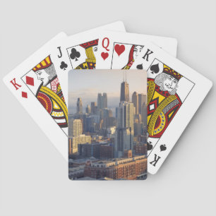 View of cityscape with fantastic light playing cards