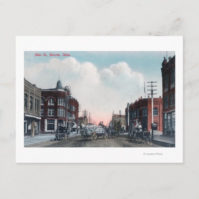 View of Main Street and Horse Carriages Postcard (Front)