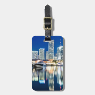 View of skyline with reflection in water, Miami Luggage Tag