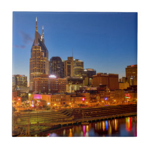 View of the city skyline at dusk ceramic tile