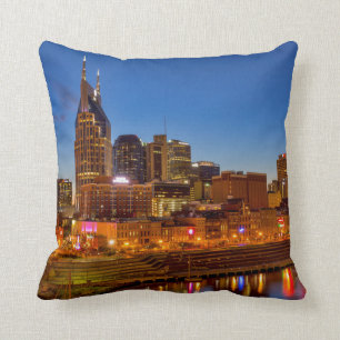 View of the city skyline at dusk cushion