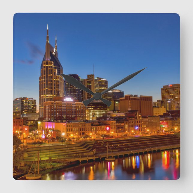 View of the city skyline at dusk square wall clock (Front)