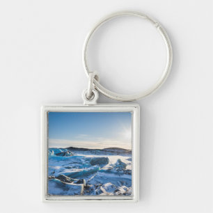 View over the frozen glacial lake key ring