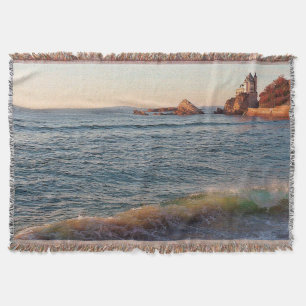 Villa on the Rocks Throw Blanket