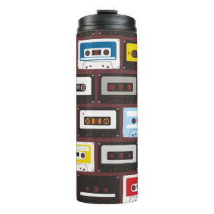 Vintage audio cassettes, seamless background. thermal tumbler