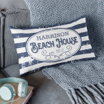 Vintage Beach House Personalised Navy and White Lumbar Cushion<br><div class="desc">Our personalised, vintage style beach house throw pillow makes a perfect addition to your summer abode! Design features nautical navy blue and white stripes and vintage style lettering, with your family name and year established for a unique customised touch. A curled rope illustration completes the design, while a unique overlay...</div>