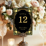Vintage Black Faux Gold Antique Elegant Wedding Table Number<br><div class="desc">This black and gold elegant wedding table number, with a vintage air, has a vintage golden frame with baroque faux gold decorations on a black background. The names are written in an elegant calligraphic script. All text can be personalised and has a golden colour similar to the gold decorations of...</div>