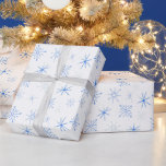 Vintage Blue and White Midcentury Snowflakes Wrapping Paper<br><div class="desc">Happy Holidays! Decorate your presents with this fun hand-drawn snowflake pattern in blue and white. Sporting the colours of Hannukah, this wrapping paper can be used for that holiday or Christmas alike. I was inspired by midcentury modern graphic design and drew these snowflakes digitally with a gritty paint brush for...</div>