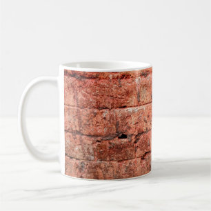 Vintage brick wall with some stones in it, brick coffee mug