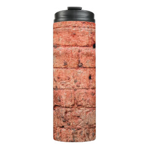 Vintage brick wall with some stones in it, brick thermal tumbler