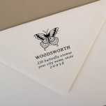 Vintage Butterfly Family Name Return Address Self-inking Stamp<br><div class="desc">Elegant return address stamp features your family name and return address underneath a vintage-style butterfly drawing. We have chosen a classic serif font for the typography. Your name is in capitals while the address information is in lowercase italics. We have kept the text as big as possible to ensure clear...</div>