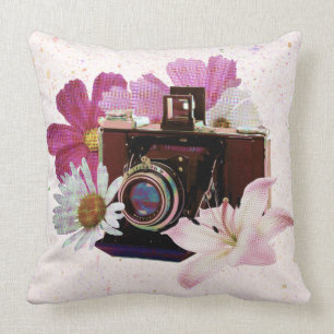 Vintage camera with flowers cushion