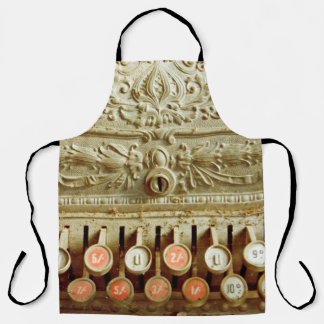 Vintage cash register,  covered in dust and cobweb apron