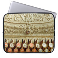 Vintage cash register, covered in dust and cobweb