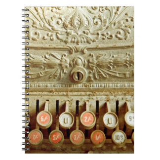 Vintage cash register,  covered in dust and cobweb notebook