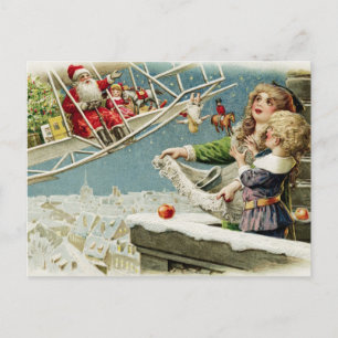 Vintage Christmas Santa in the Aeroplane and Kids Postcard