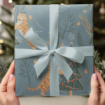 Vintage Christmas Tiger with Christmas Tree Blue  Wrapping Paper<br><div class="desc">Celebrate the holidays with this whimsical Vintage Christmas Tiger wrapping paper, featuring tigers surrounded by Christmas trees on a soft blue background. This retro-inspired design adds a playful yet elegant touch to your holiday gift-giving. Perfect for those who appreciate unique, vintage holiday themes, it brings a cosy, festive charm to...</div>