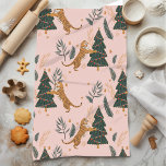 "Vintage Christmas Tiger with Christmas Tree Pink Tea Towel<br><div class="desc">Add a touch of vintage charm to your kitchen this holiday season with the Vintage Christmas Tiger with Christmas Tree Pink Kitchen Towel. Featuring a playful tiger surrounded by festive holiday elements on a soft pink backdrop, this towel brings retro-inspired whimsy to your holiday decor. Perfect for adding seasonal cheer...</div>