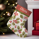 Vintage Christmas Watercolor Holly Leaves Monogram Small Christmas Stocking<br><div class="desc">Celebrate the holiday season with this charming vintage Christmas stocking featuring beautiful watercolor holly leaves and a customisable monogram. Crafted with attention to detail, this stocking adds a touch of elegance and nostalgia to your holiday decor. Perfect for hanging by the fireplace, it makes a wonderful gift for loved ones....</div>