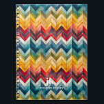 Vintage Colourful Chevron Monogram Notebook<br><div class="desc">Presenting our stylish monogram design, showcasing large typography initials in a timeless classic font, complemented by your name below and adorned with chic rainbow-coloured chevron stripes. We're all familiar with that special moment of selecting the perfect notebook for a project, choosing the journal that will accompany us to document our...</div>