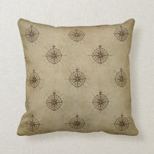 Vintage Compasses on Brown Cushion