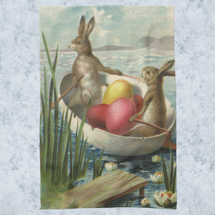 Vintage Easter Bunnies in a Boat with Easter Eggs Tea Towel